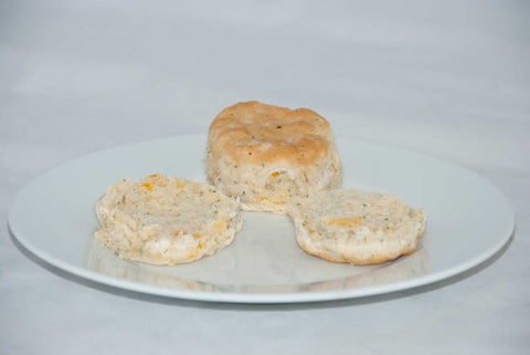 General Mills Pillsbury Unbaked Garlic Cheddar Biscuit Dough, 1.2 Ounce -- 210 per case.