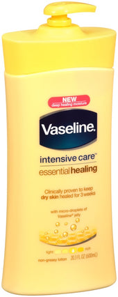 Vaseline Intensive Care Essential Healing Body Lotion, 20.3 Ounce -- 4 per case.