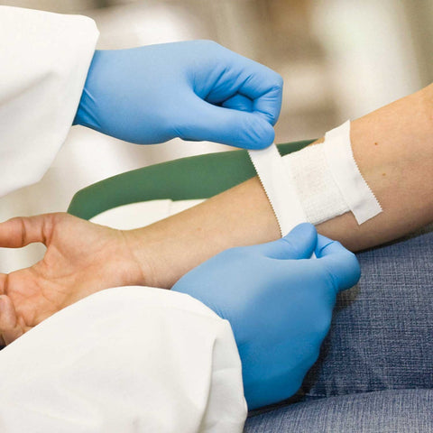 Handgards ExamGards Blue Medium Disposable Nitrile Gloves -- 1000 per case.