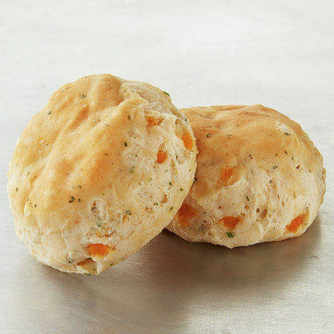 General Mills Pillsbury Unbaked Garlic Cheddar Biscuit Dough, 1.2 Ounce -- 210 per case.