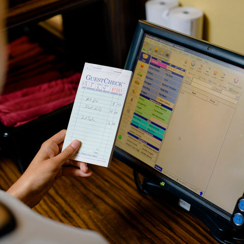 National Checking Company Carbonless Guest Check Paper - 2 Part Green, 17 Line, 3.4 x 6.75 inch -- 2500 per case.